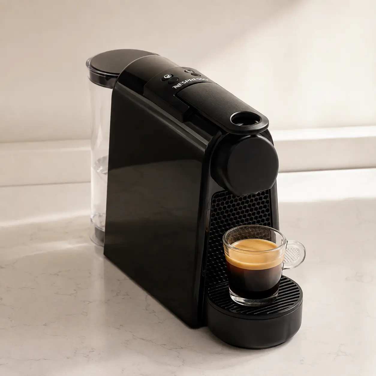 Black Nespresso Essenza Mini coffee machine from a second angle